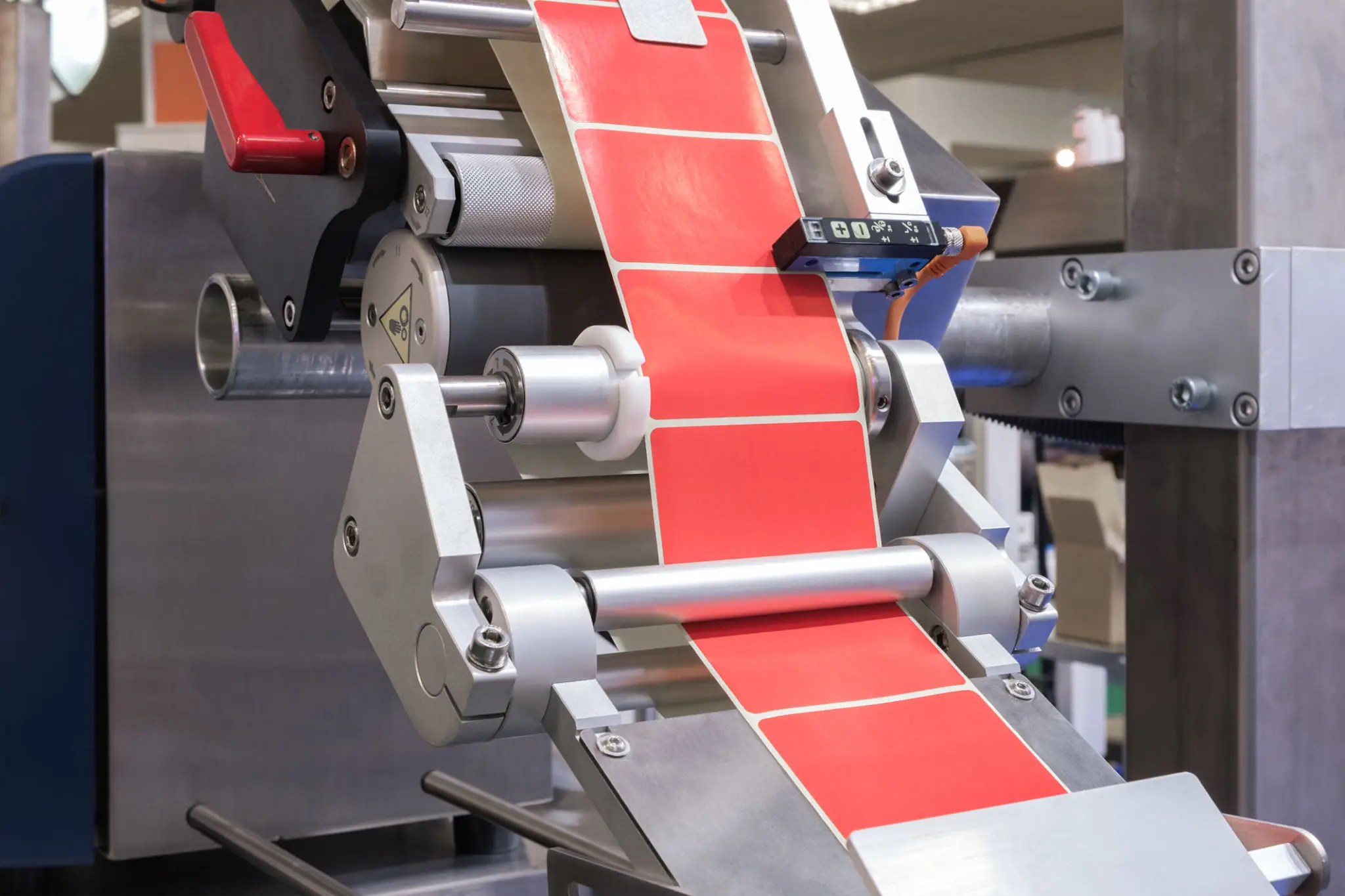 Industrial label printing machine with red labels